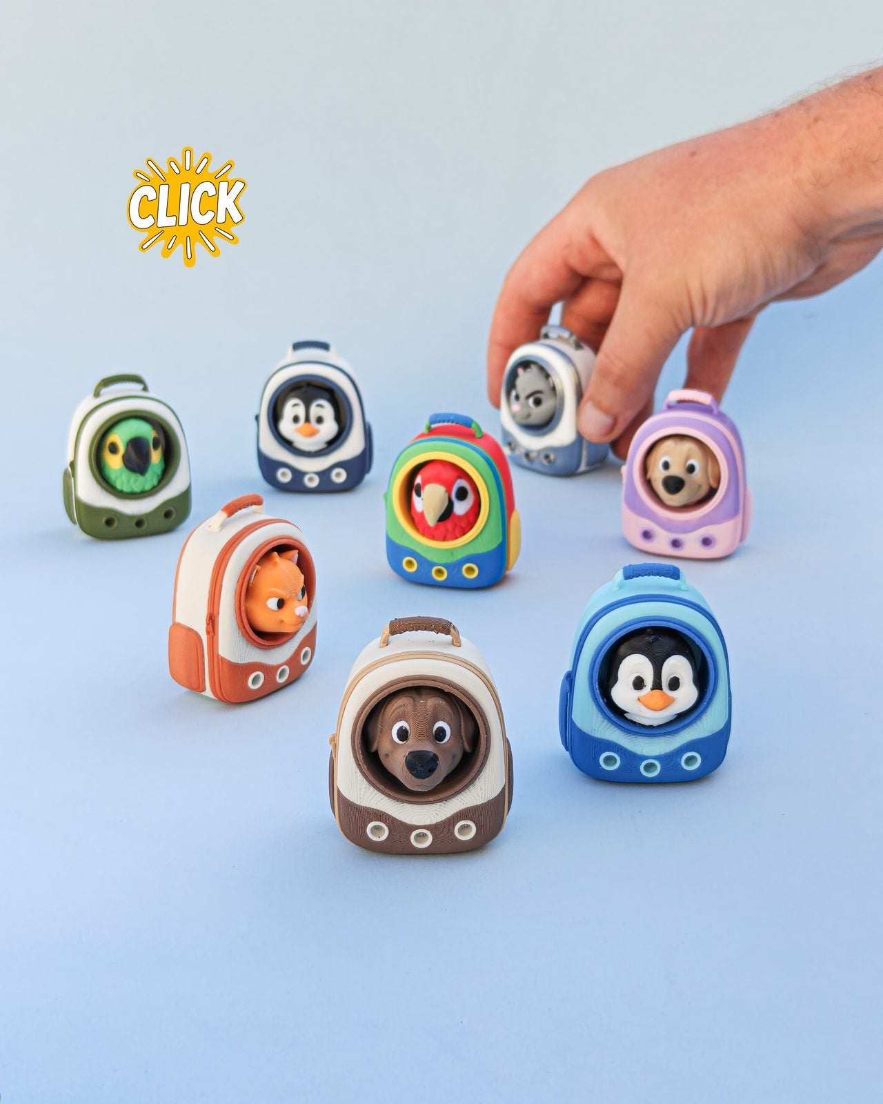 Eight pet carrier backpack clickers with dogs, cats, penguins and parrots in the windows